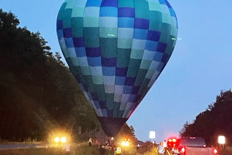 Emergency landing: hot air balloon safely touches down on Vermont highway median  
